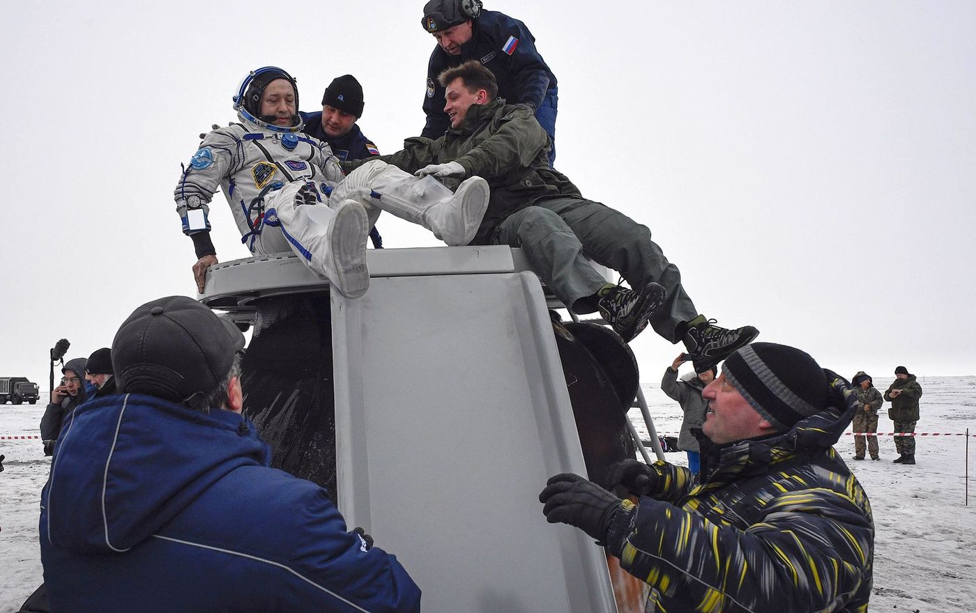 Cosmonaut Alexander Misurkin exits the Soyux MS-06 space vehicle shortly after landing on Earth.