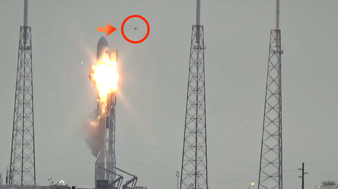 Strange unidentified flying object buzzes past the tip of the rocket, from right to left, just before the explosion.