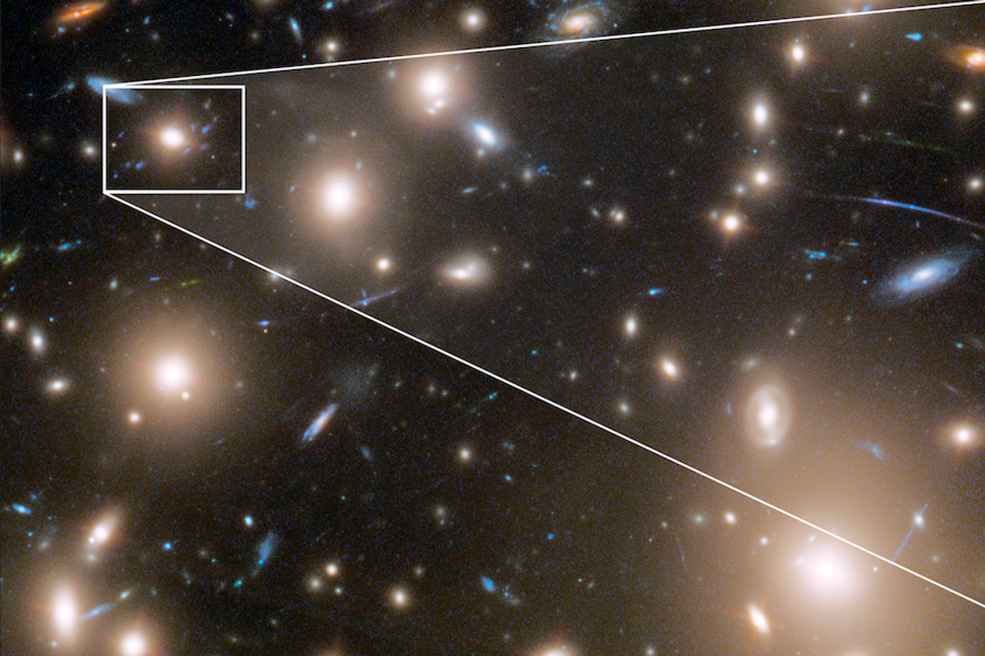 NASA image showing a supernova's light from behind galaxy cluster Abell 370. (Credit: NASA/Wenlei Chen)