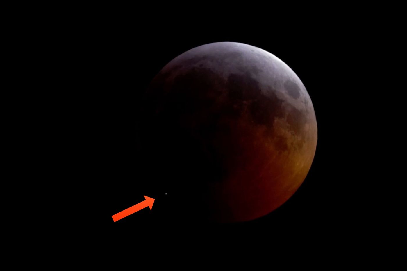 In this image, we see the white dot on the lunar surface depicting the unexpected meteorite strike during this past weekend's lunar eclipse.