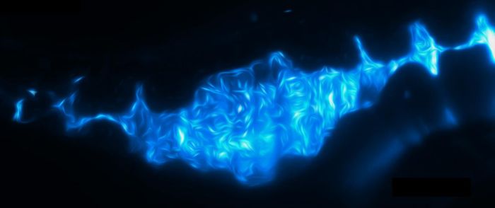 Stylized merged image from a time-series of the victor, a strain of Vibrio cholerae (cyan), highlighting its spry and highly motile nature within the convoluted confines of the gut (dark silhouette). / Credit: Matthew Jemielita and Travis Wiles