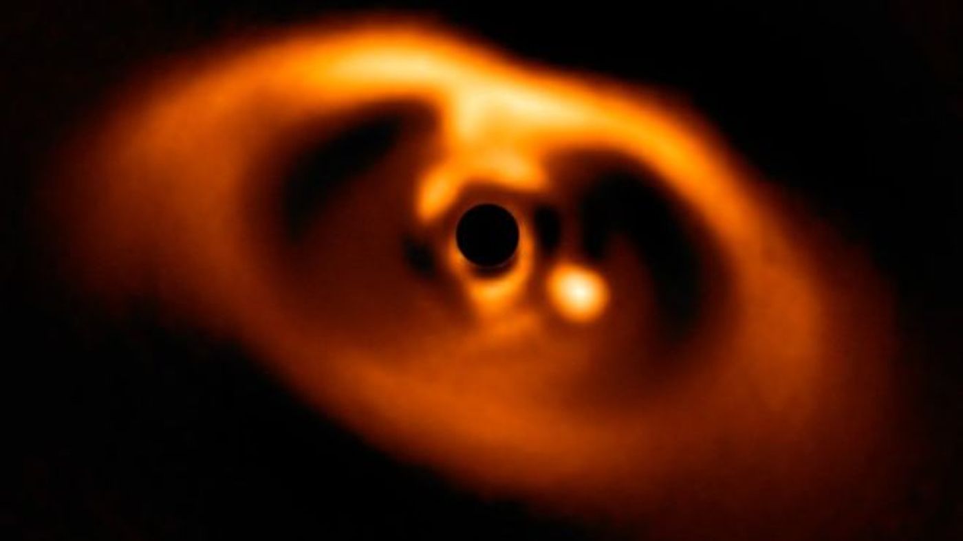 Here we can see an exoplanet forming below and to the right of the star PDS 70.