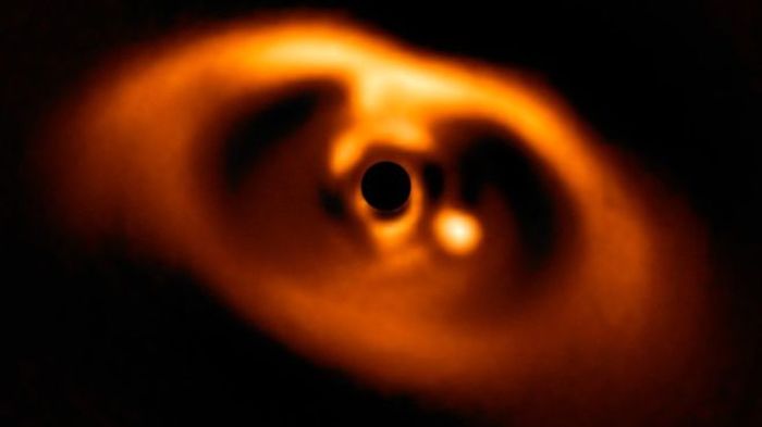 Here we can see an exoplanet forming below and to the right of the star PDS 70.