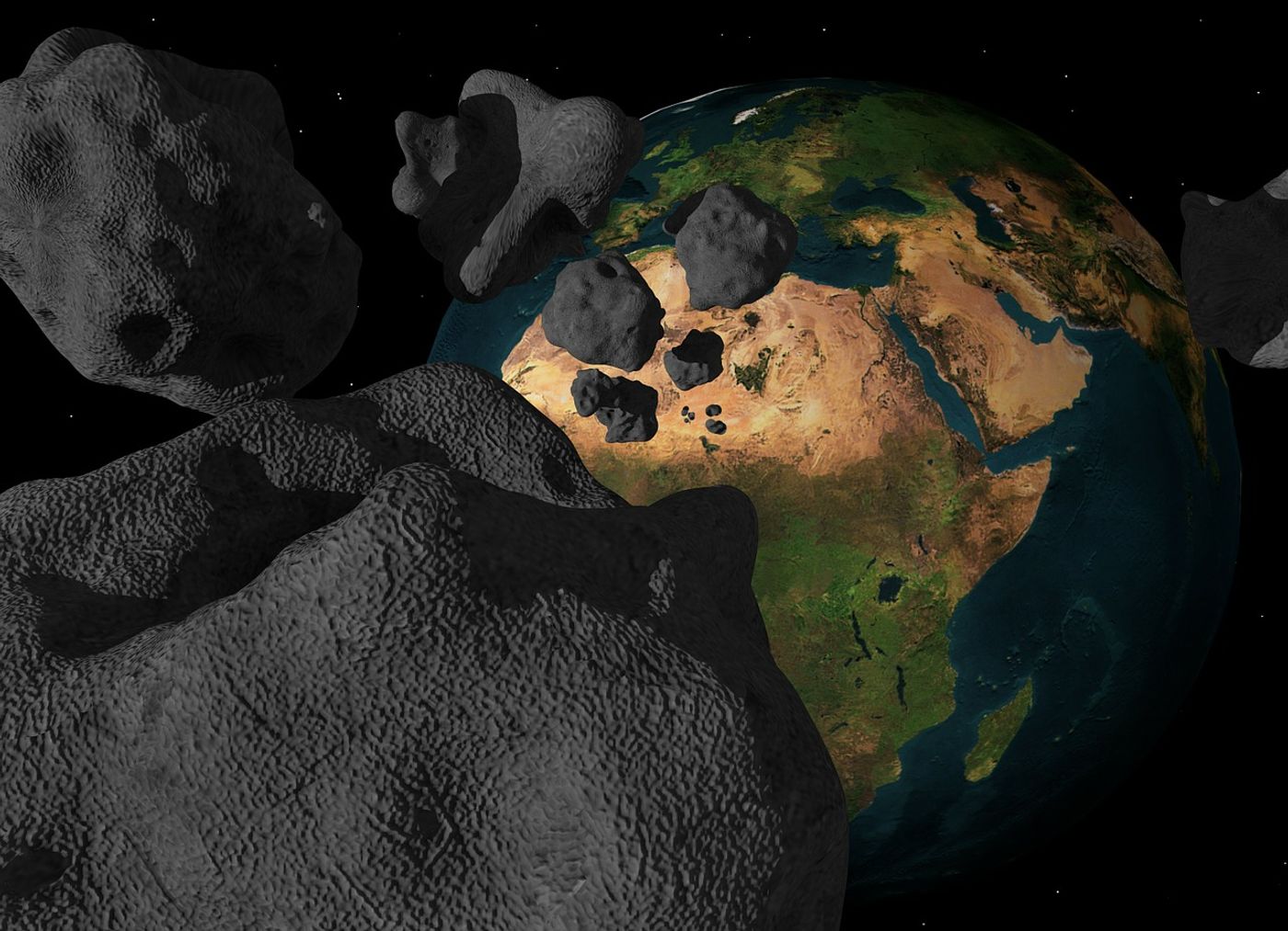 An artist's impression of an asteroid cluster heading for the Earth.