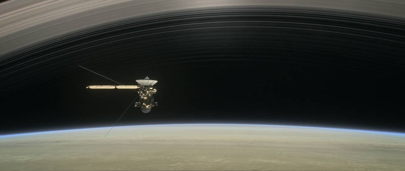 An artist's rendition of Cassini, as it flies in between Saturn and its rings.