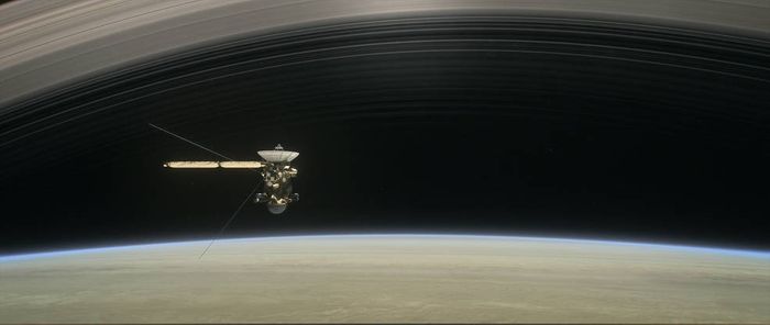 An artist's rendition of Cassini, as it flies in between Saturn and its rings.