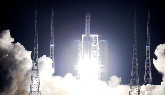 China's Long March 5 rocket lifts off from its launchpad.