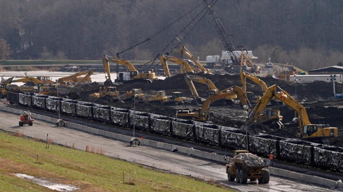 Coal ash from the Kingston Fossil Plant spill is loaded onto train cars. Four million tons of it was hauled to Uniontown, Alabama