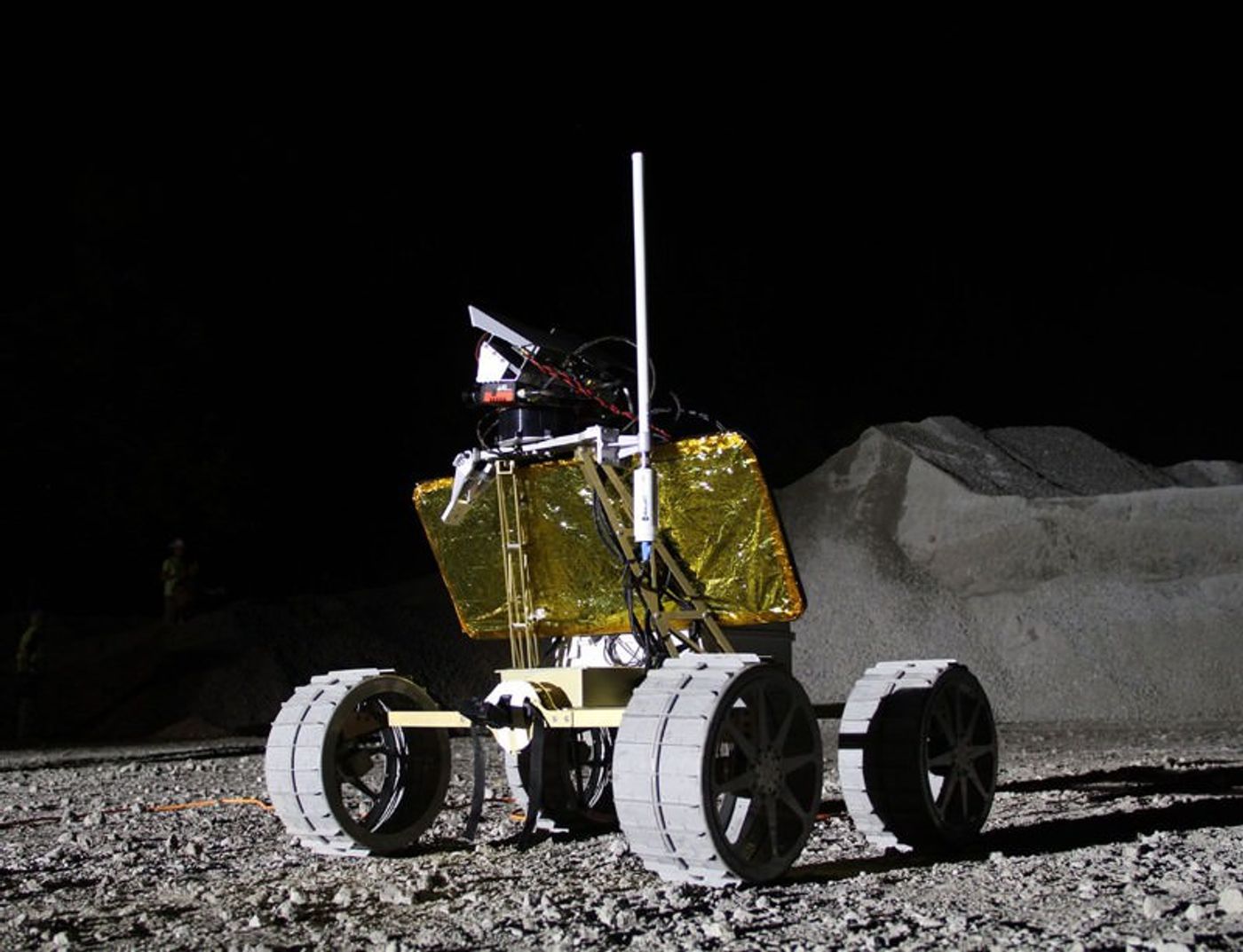 Creating a rover that can move across the Moon's surface and record HD video/photos is a requirement for the race.