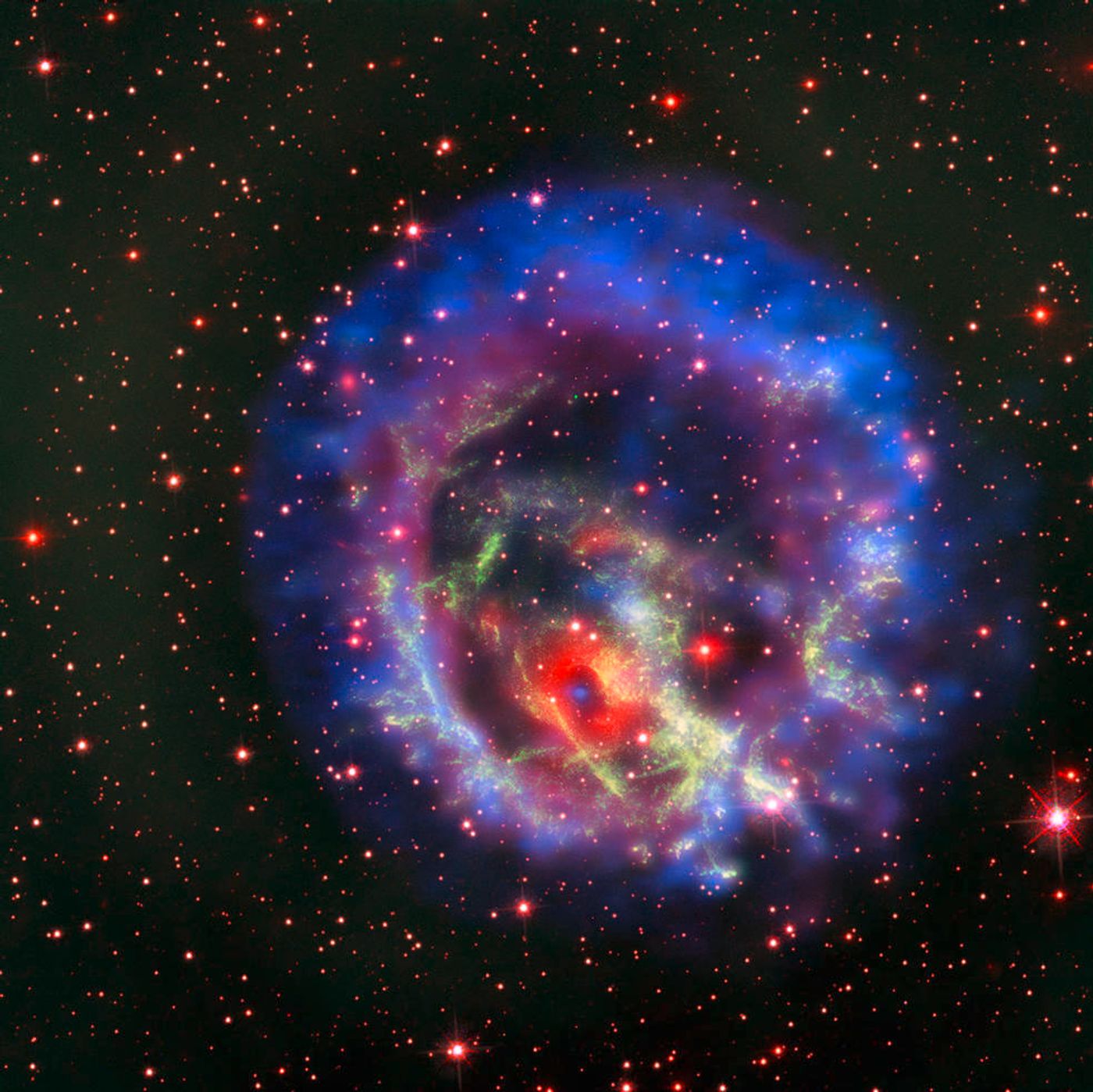 A composite image showing 1E 0102.2-7219 in all its glory.