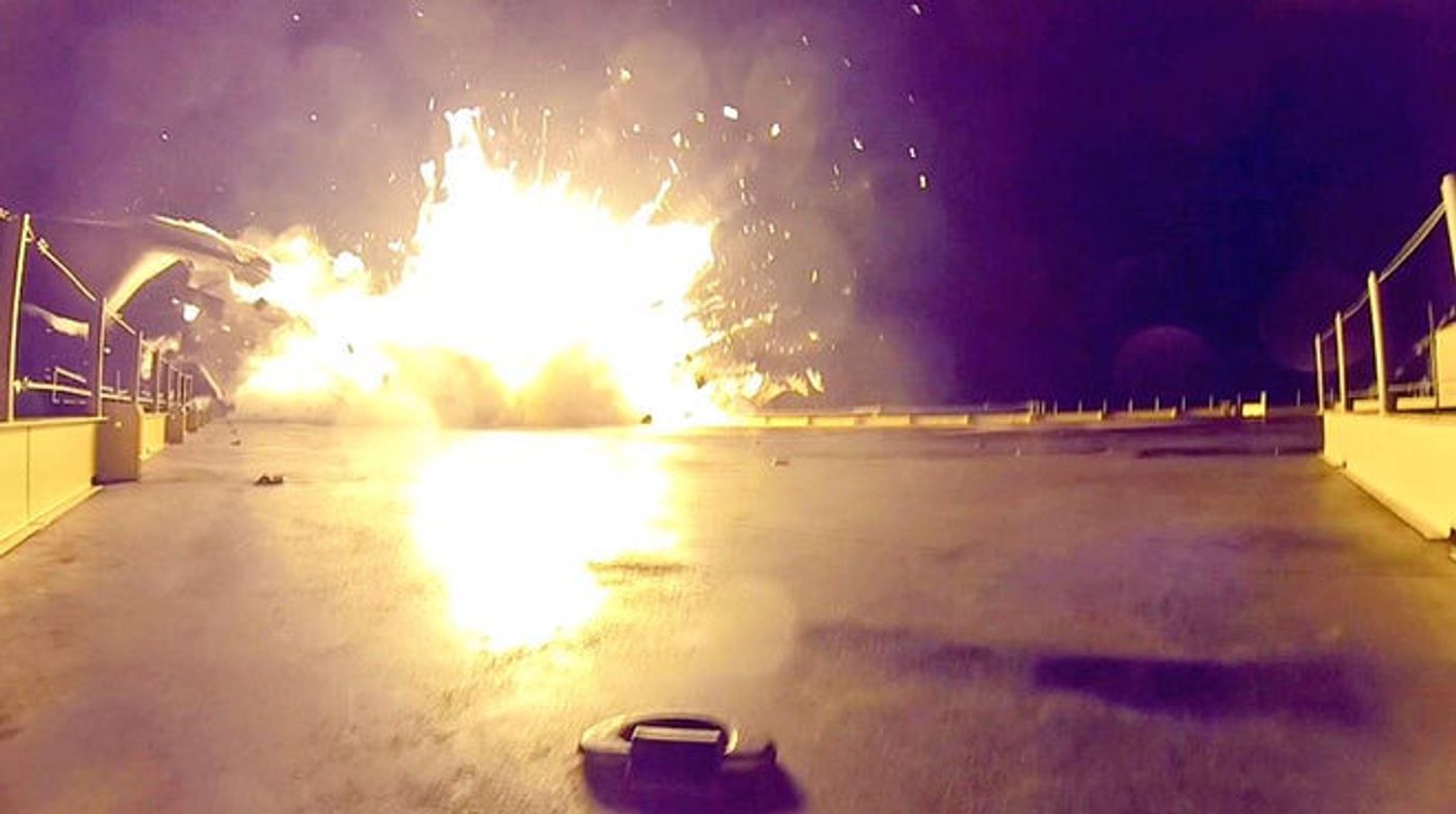 A SpaceX rocket comes to a crash landing on the drone ship at sea in 2015.