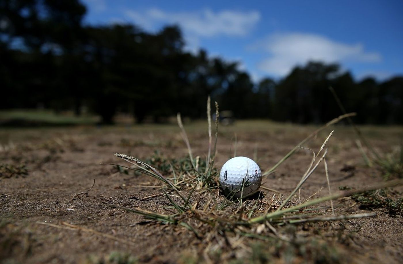 A golf ball sits in a dry spot on a fairway at Gleneagles Golf Course on July 11, 2014 in San Francisco, California. (Justin Sullivan/Getty Images)