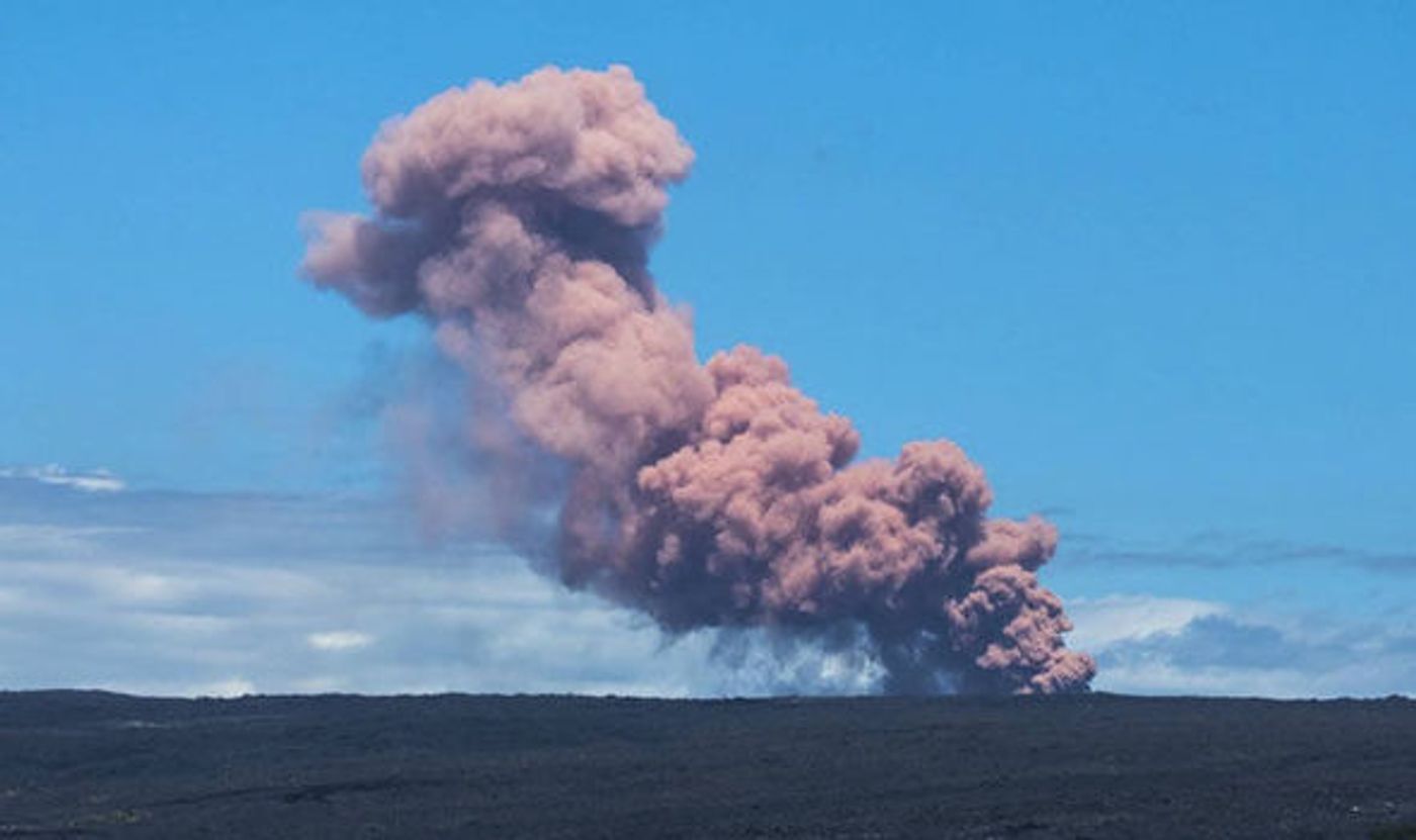 A plume of smoke and ash covers the sky. Photo: Daily Express