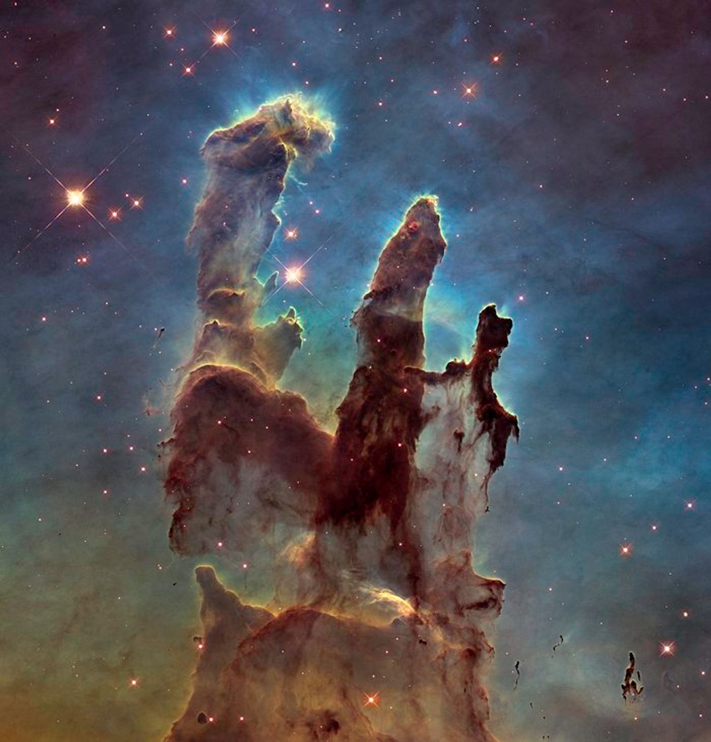 January 5, 2015: This is a revisit of one of the most iconic images that Hubble has ever taken, Eagle Nebula's Pillars of Creation. (NASA, ESA/Hubble and the Hubble Heritage Team)