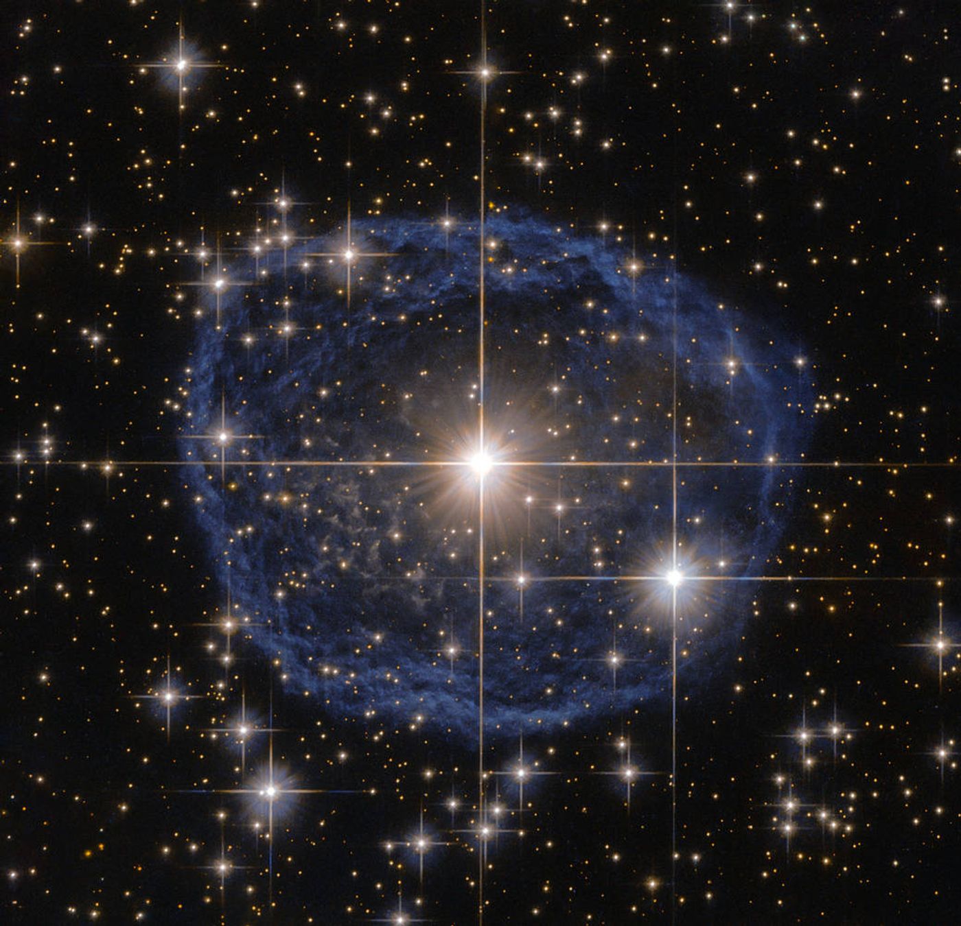 The Hubble Space Telescope captures a great image of a blue nebula surrounding Wolf-Rayet star WR 31a.