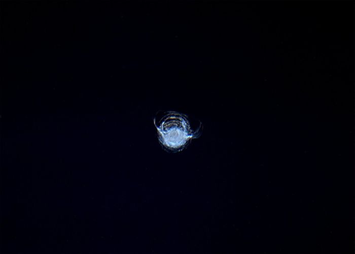 A 7mm chip is shown in the International Space Station's Cupola glass window.