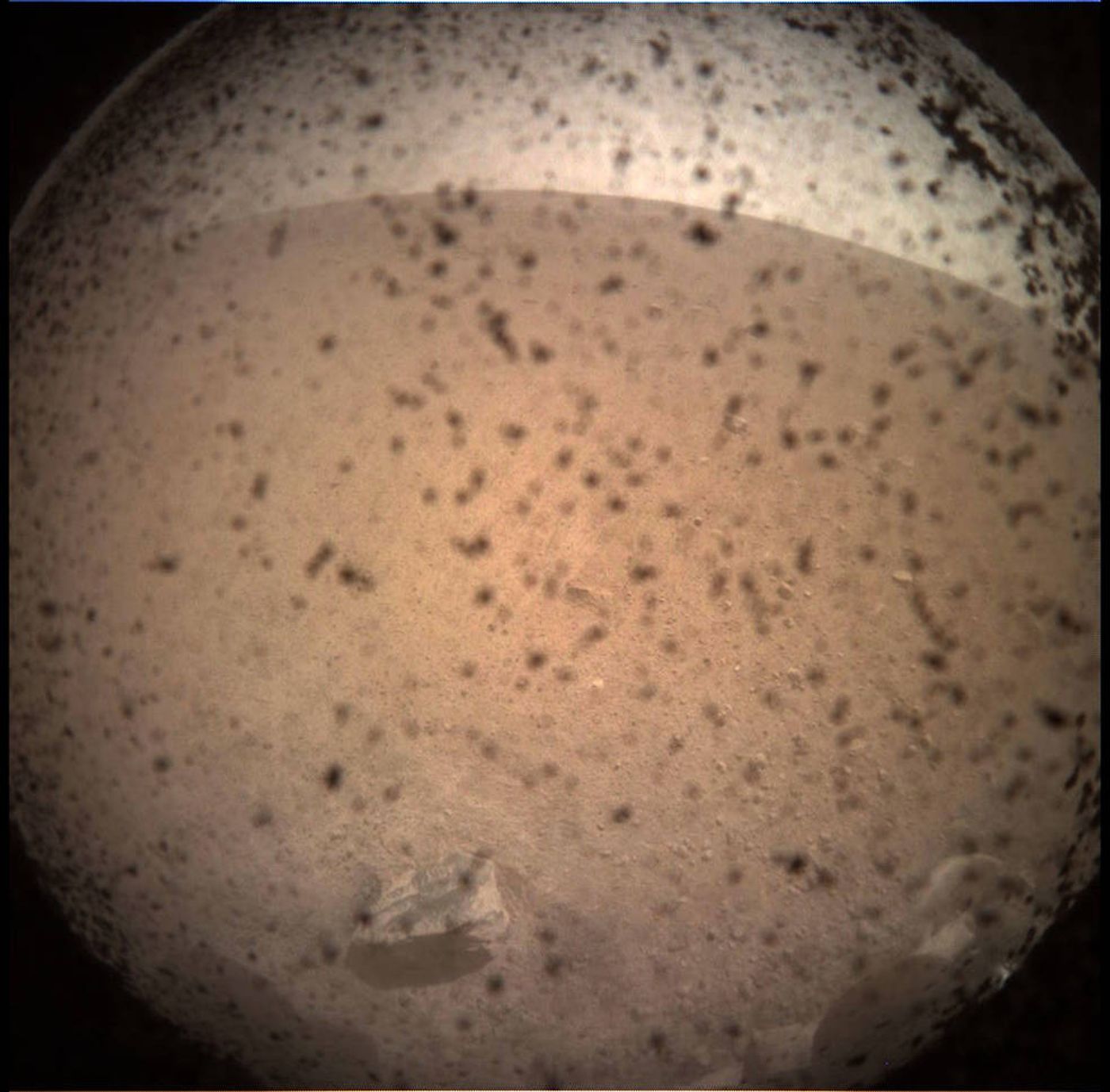 An image of Mars captured with InSight's onboard camera system before landing.