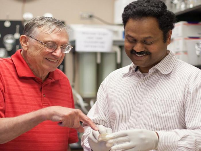 In the lab of George Fox, left, Madhan Tirumalai, right, is helping unravel the mysteries of space microbiology CREDIT University of Houston