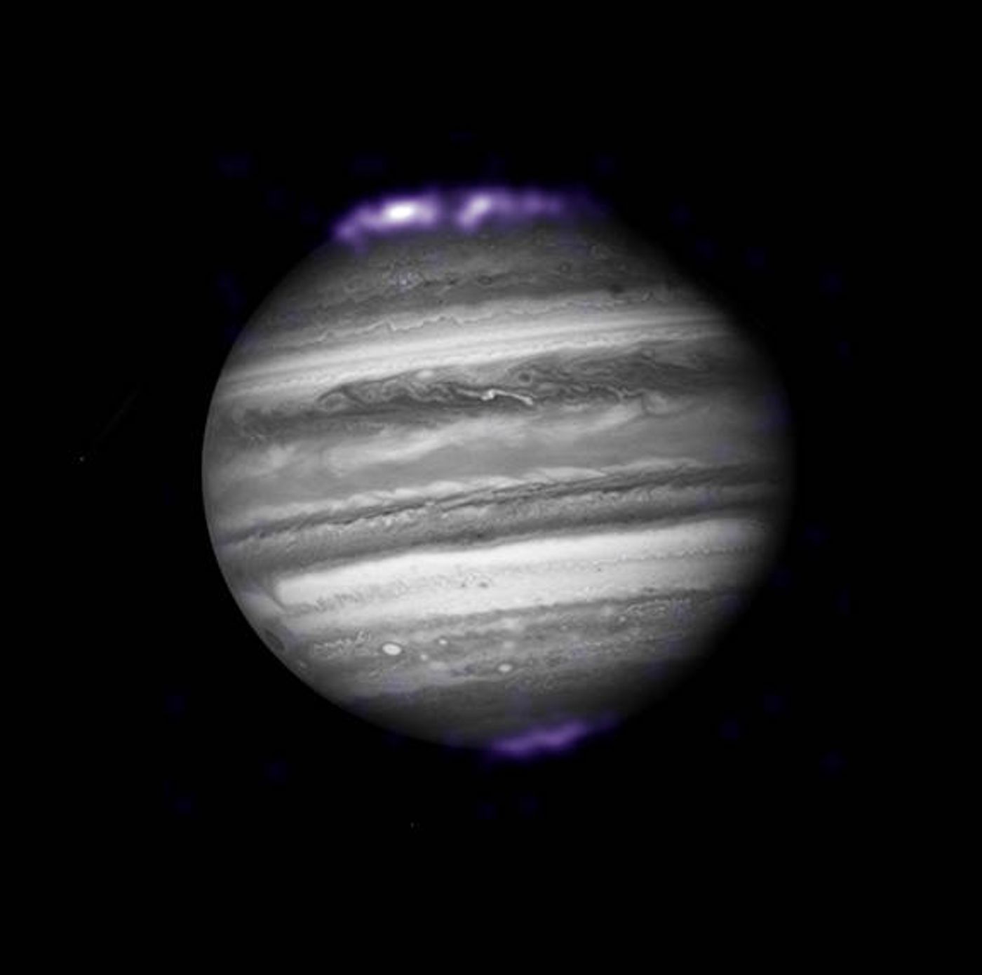 This infrared image taken of Jupiter in 2007 shows its aurora glowing intensely.