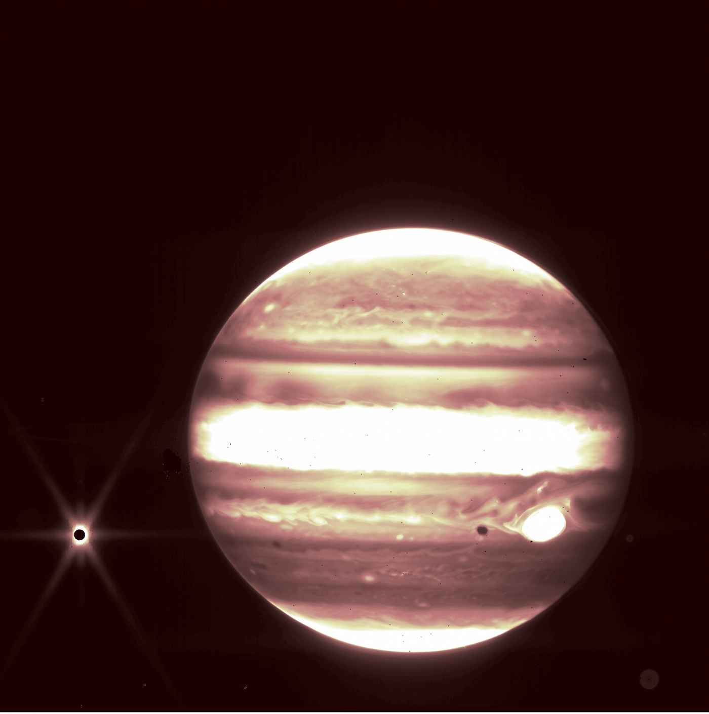 A 2.12 micron image of Jupiter (right) and its moon Europa (left) obtained by the James Webb Space Telescope. Credit: NASA, ESA, CSA, B. Holler and J. Stansberry (STScI)