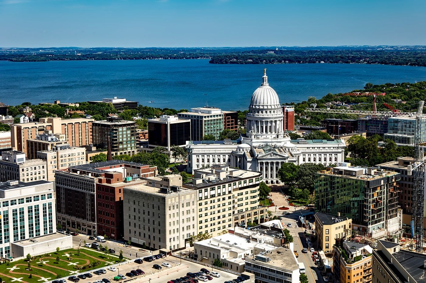 Madison, WI. Image by <a href="https://pixabay.com/users/12019-12019/?utm_source=link-attribution&amp;utm_medium=referral&amp;utm_campaign=image&amp;utm_content=1809575">David Mark</a> from <a href="https://pixabay.com/?utm_source=link-attribution&amp;utm_medium=referral&amp;utm_campaign=image&amp;utm_content=1809575">Pixabay</a>