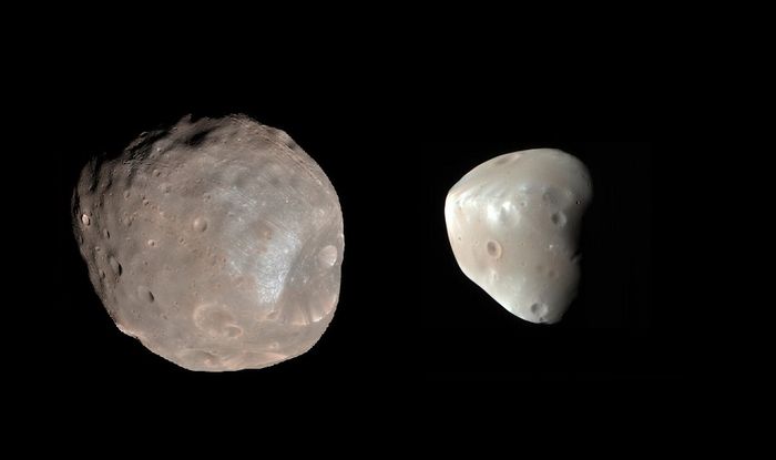 Mars' two moons, Deimos and Phobos in perspective of one another.