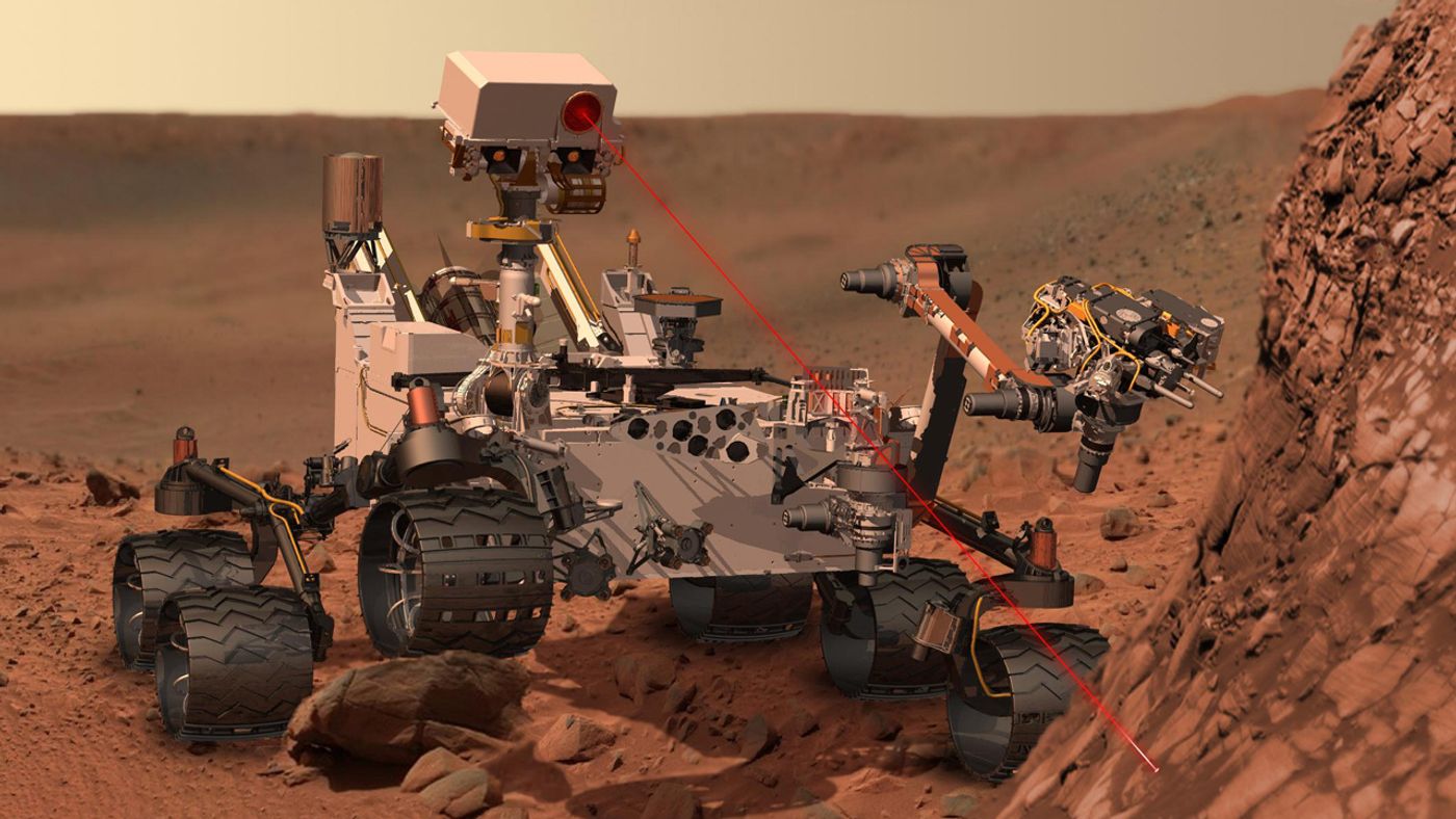 An artist's impression of the Curiosity rover as it uses its onboard laser system to observe the chemical composition of rocks.