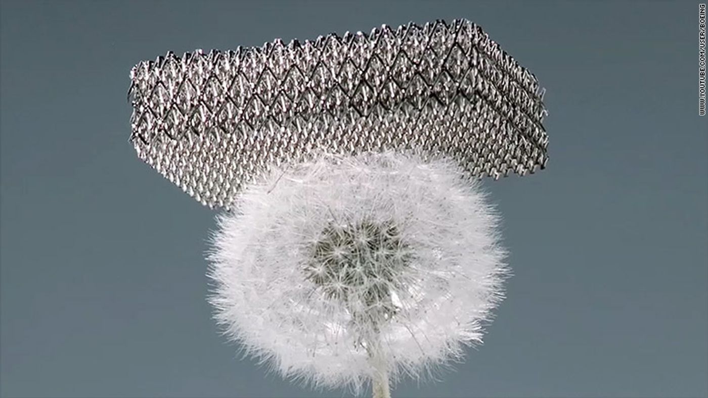 The microlattice materical can sit atop a dandelion without crushing the seeds.