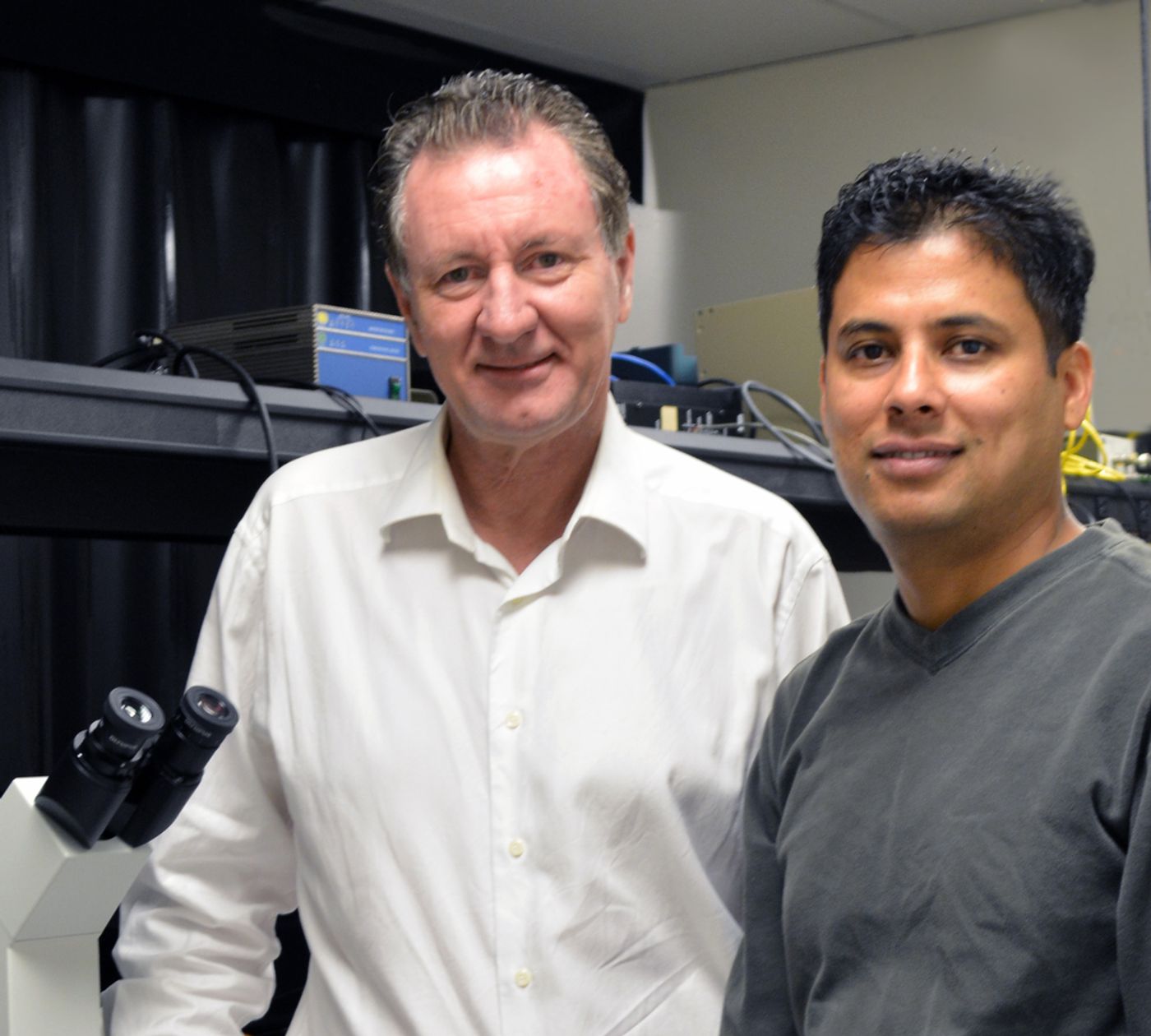 The Scripps Research Institute's Professor David Millar (left) and Research Associate Rajan Lamichhane were among the authors of the new paper.