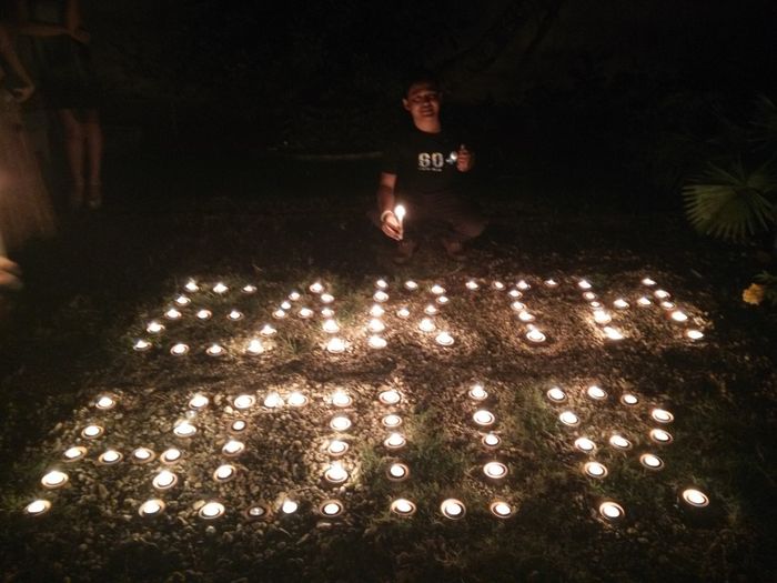 People celebrating Earth Hour in Myanmar with candles for light. Photo: Earth Hour