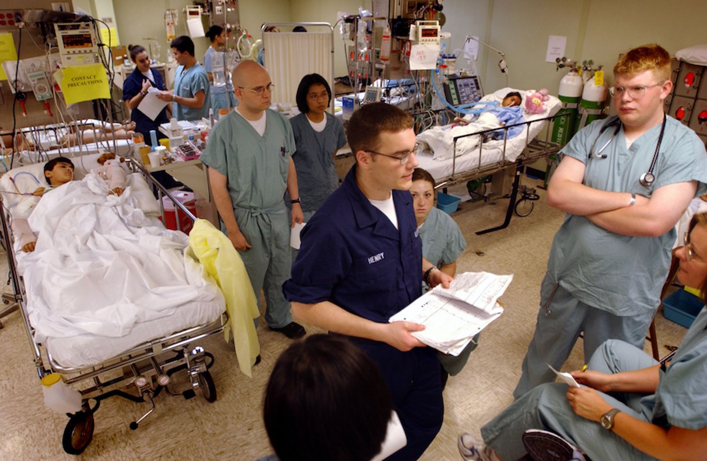 Shift workers are often filling critical positions, but can face increased health risk. In this photo, Hospital Corpsman Wade Henry gives a passdown to the night shift in the Intensive Care Unit (ICU) aboard USNS Comfort (T-AH 20). / Credit: U.S. Navy photo by Photographer's Mate 1st Class Shane T. McCoy.