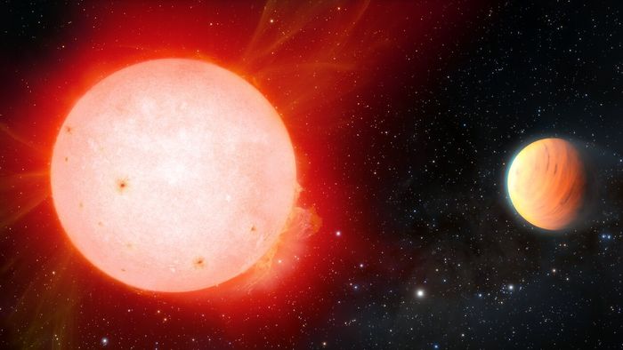 This is an artist's impression of a fluffy gas giant planet orbiting a red dwarf star. Credit: NOIRLab/NSF/AURA/J. da Silva/Spaceengine/M Zamani
