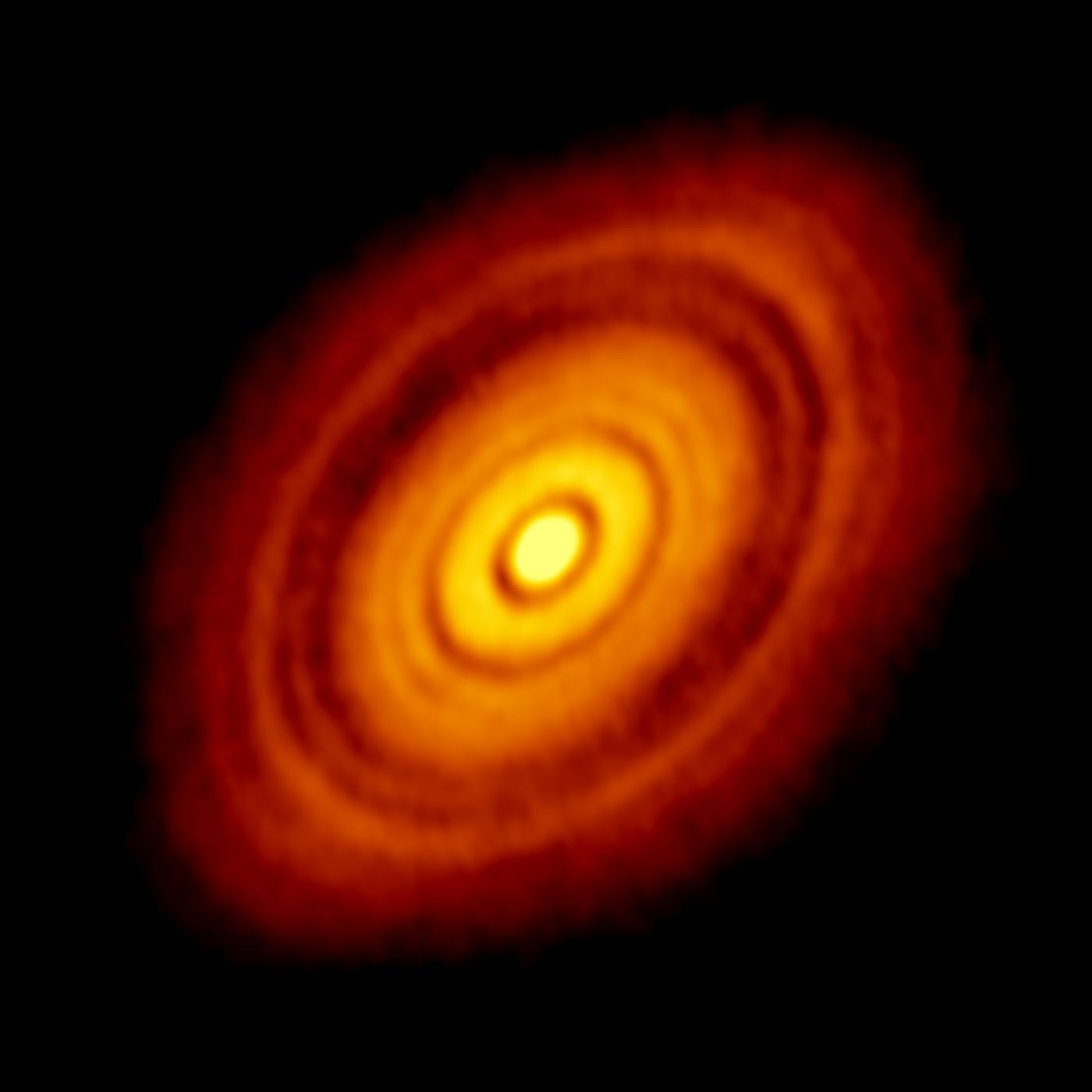 This is an image of the young star HL Tau and its protoplanetary disk, captured by ALMA. Credit: ALMA (ESO/NAOJ/NRAO); C. Brogan, B. Saxton (NRAO/AUI/NSF)
