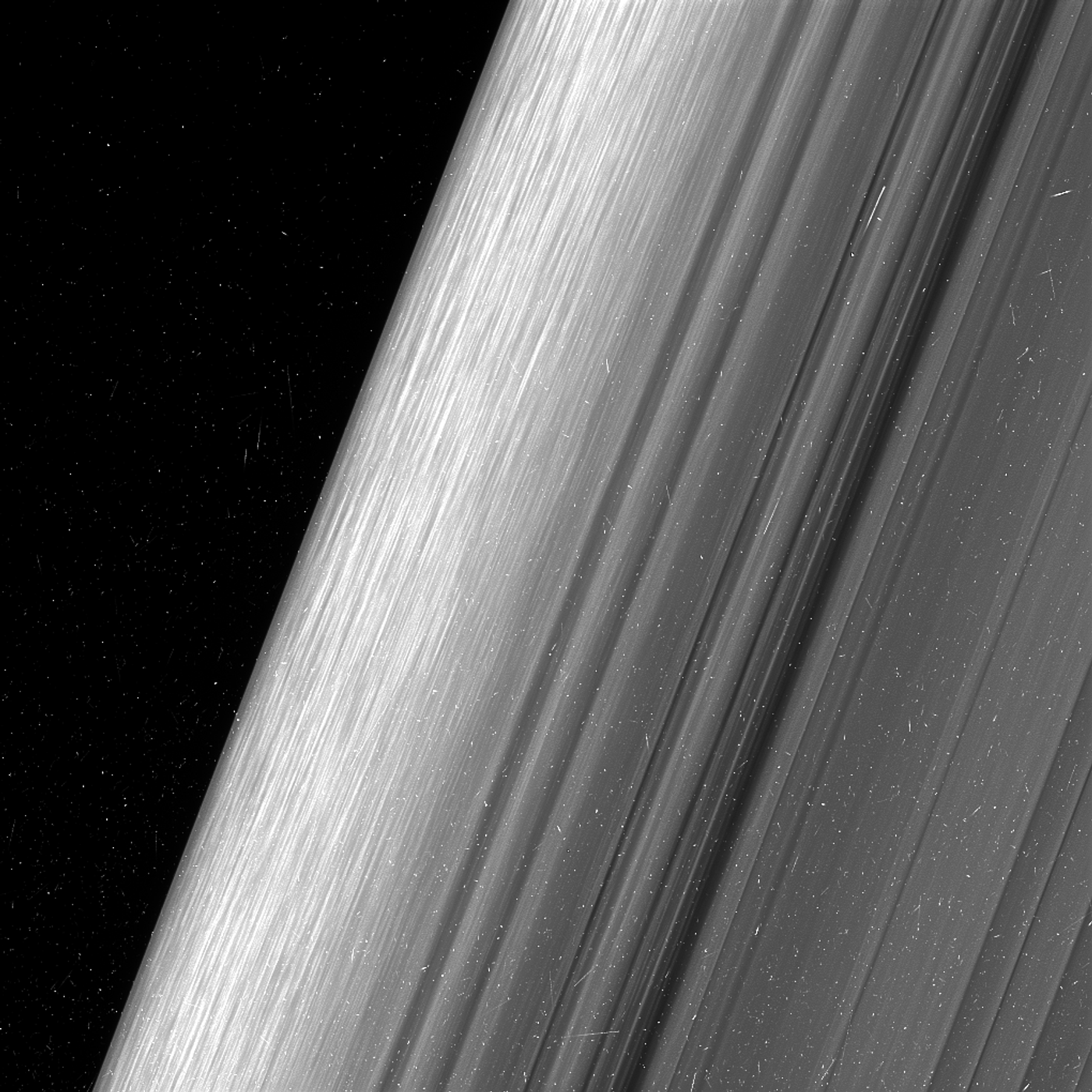 This image shows the horizon of Saturn's outer B ring, and also shows more of the details hidden in the rings.