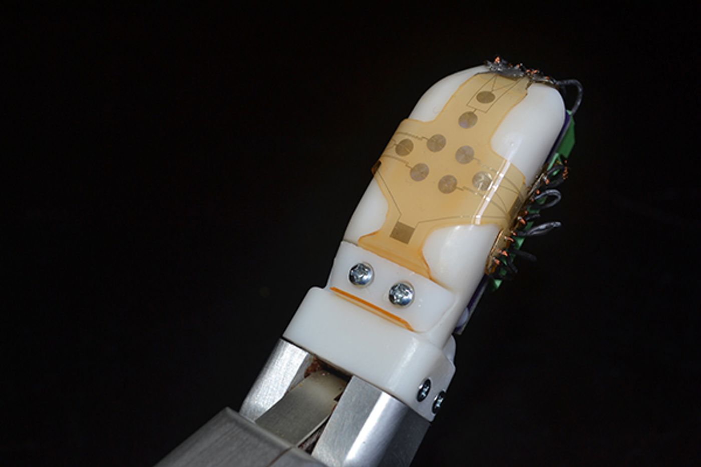 sensor skin on robotic finger, credit: UCLA Engineering