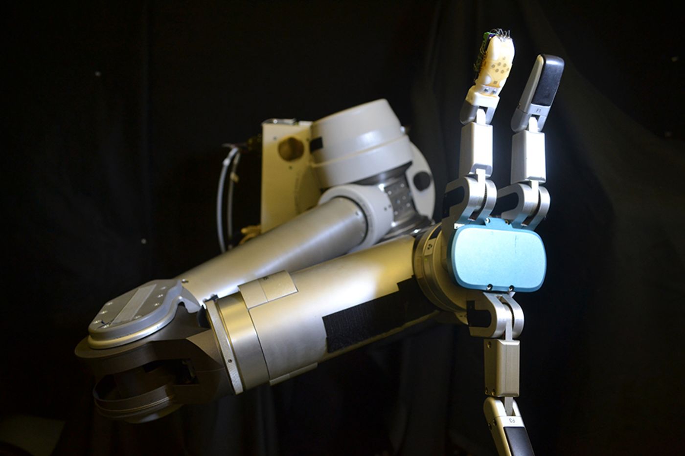 sensor skin on robotic arm, credit: UCLA Engineering