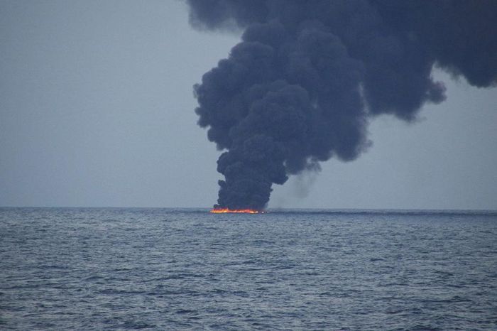 The tanker, burning on the sea. Photo: Reuters