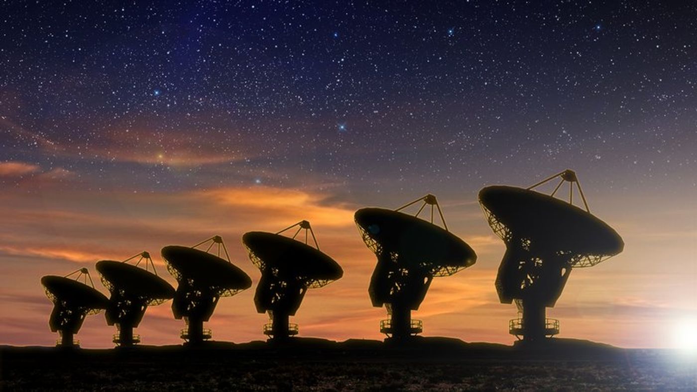 SETI uses an array of radio signal antennas to listen for sources of radio activity from space.