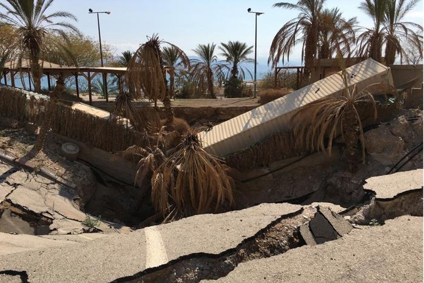 Entrance area to Mineral Beach on the Dead Sea. The sinkhole formed overnight and fortunately no one was injured.  Credit  UFZ