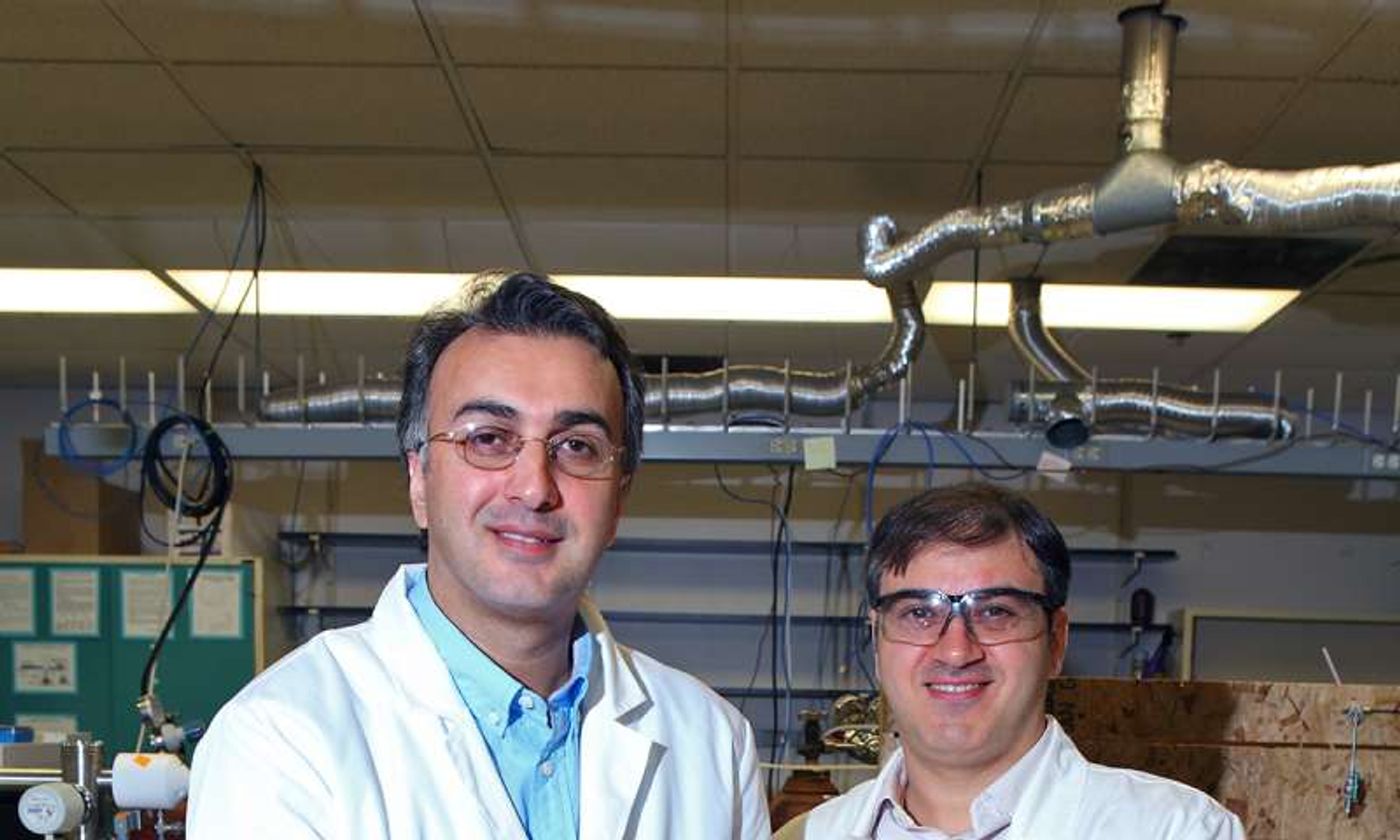 Amin Salehi-Khojin, UIC assistant professor of mechanical and industrial engineering (left), and postdoctoral researcher Mohammad Asadi with their breakthrough solar cell that converts atmospheric carbon dioxide directly into syngas. Credit: University of Illinois at Chicago/Jenny Fontaine  Read more at: https://phys.org/news/2016-07-breakthrough-solar-cell-captures-carbon.html#jCp