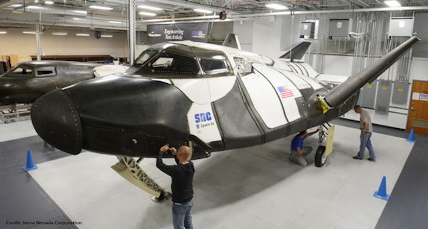 Technicians with the sub-orbital version of SNC's Dream Chaser