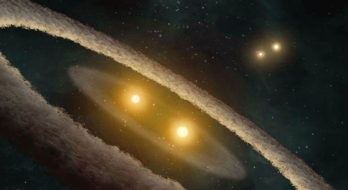 Artist's impression of HD 98800, a quadruple-star system. This system could be similar to the more massive triple-star system TIC 470710327, where there were once two binary systems, but one of them merged into one bigger star. Credit: NASA/JPL-Caltech/UCLA
