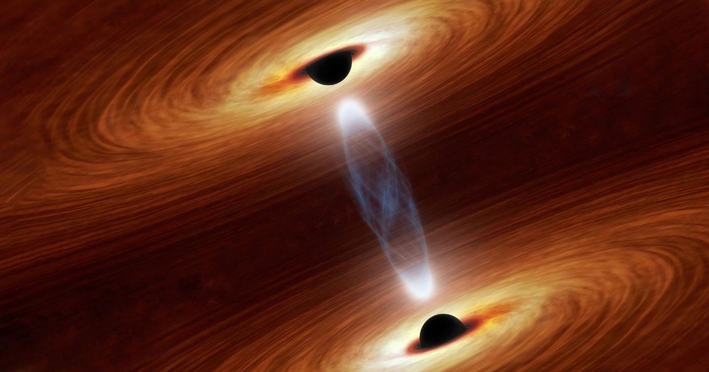 Credit: Artist's rendition of two supermassive black holes on a collision course. (Credit: NASA/Victor Tangermann)