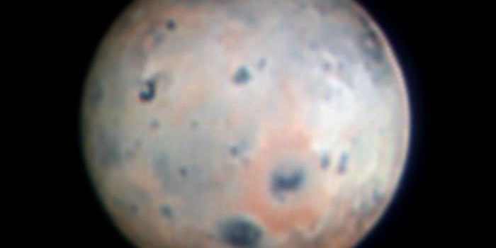 Observations of Jupiter's Moon, Io, with SHARK-VIS