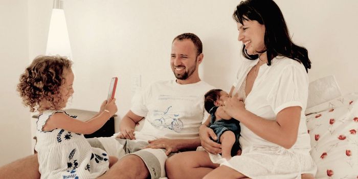 Parents Change Each Other's Brain Activity When with Children