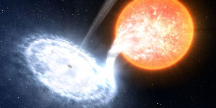 Astronomers Observe Red Flashes From a Black Hole Eating a Star