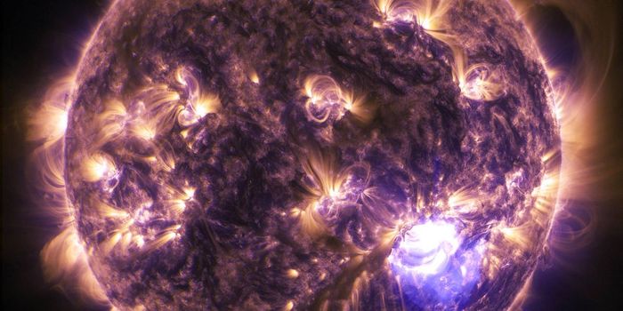 Presence of plasma inhibits ultra-relativistic energies in solar storms