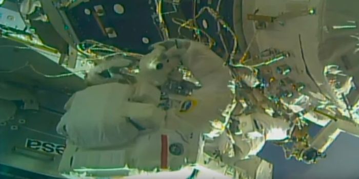 Spacewalking Astronauts Install New Docking Adapter on International Space Station