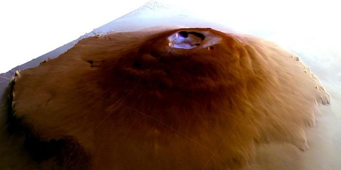 First Detection of Frost on Mars' Equatorial Volcanoes