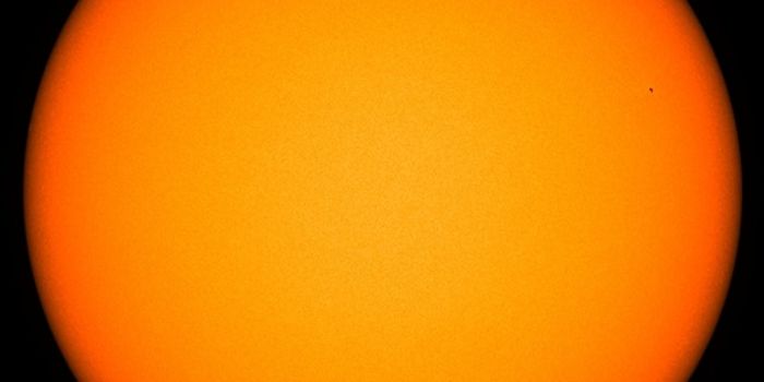 Why the Sun's Outermost Layer Spins Faster Than the Interior